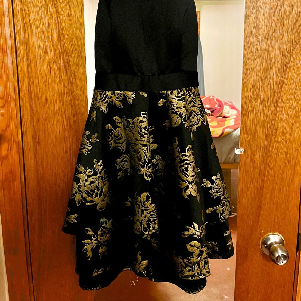 What:  black Hoco dress with gold flower accents